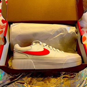 Nike white, orange, cheetah print